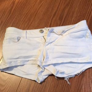 White distressed shorts